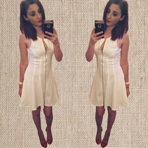 White fitted zipper down flair dress